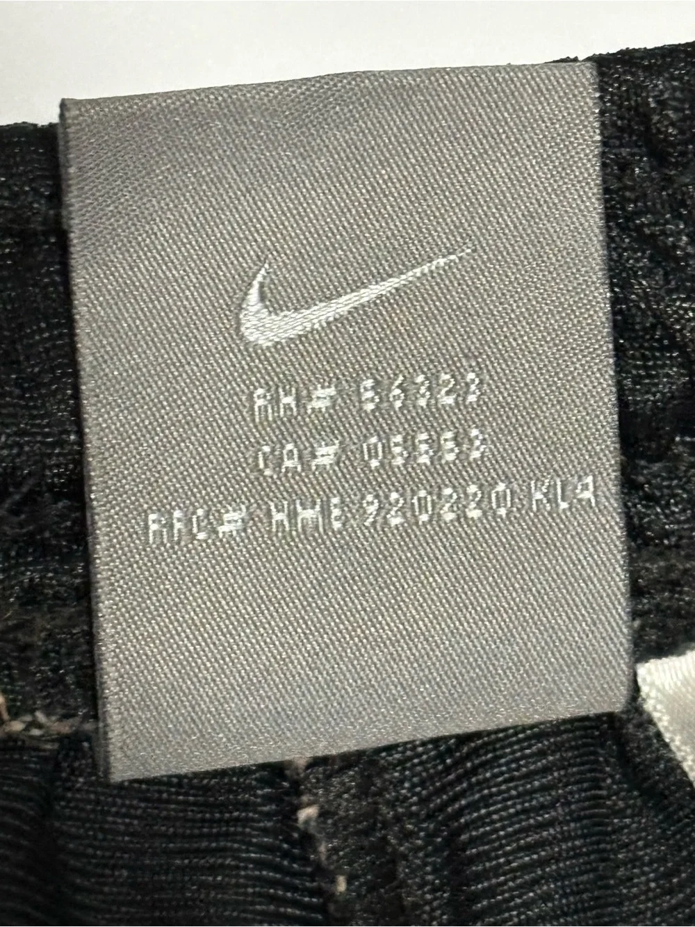 Nike Black Athletic Basketball Shorts with White Swoosh
